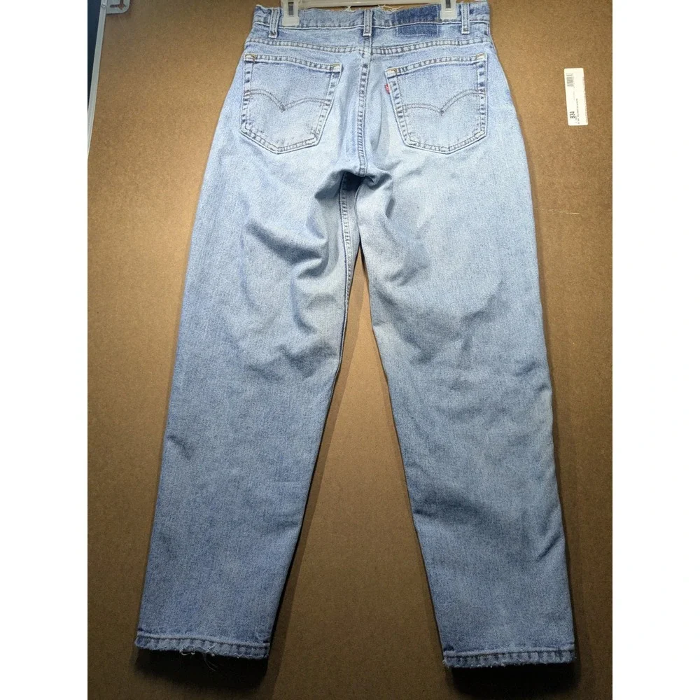 Vintage Levis 560 Loose Fit Tapered Leg Jeans Light Wash Made in USA 32x30